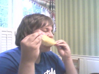 Andrew eating corn