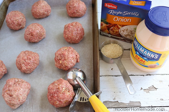 This All-American Barbecue Burger is the BEST you will ever eat! Made with a secret ingredient and piled high with barbecue/mayo sauce, cheese, lettuce and pickles all on a special onion bun! 