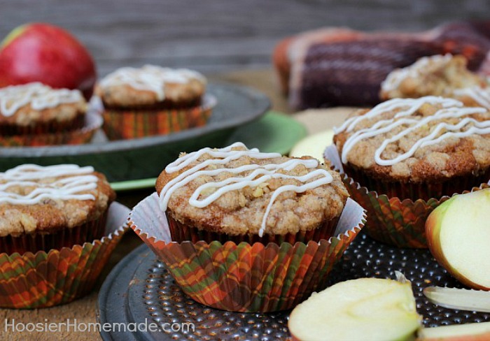 APPLE CRUMBLE CUPCAKES -- These Apple Pie Cupcakes aren't your ordinary cupcakes! The combination of chopped apples and applesauce makes these Apple Cupcakes moist and flavorful. The crumble topping adds a bit of crunch that pairs perfectly with the cinnamon and nutmeg in the cupcakes.