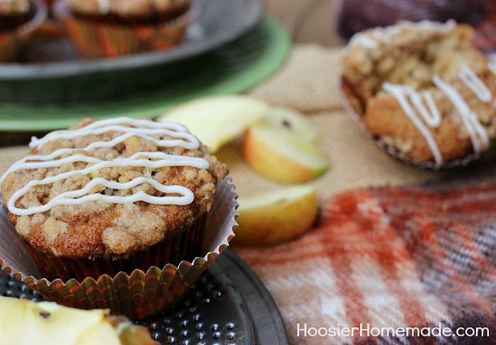 APPLE CRUMBLE CUPCAKES -- These Apple Pie Cupcakes aren't your ordinary cupcakes! The combination of chopped apples and applesauce makes these Apple Cupcakes moist and flavorful. The crumble topping adds a bit of crunch that pairs perfectly with the cinnamon and nutmeg in the cupcakes.