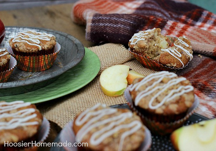 APPLE CRUMBLE CUPCAKES -- These Apple Pie Cupcakes aren't your ordinary cupcakes! The combination of chopped apples and applesauce makes these Apple Cupcakes moist and flavorful. The crumble topping adds a bit of crunch that pairs perfectly with the cinnamon and nutmeg in the cupcakes.