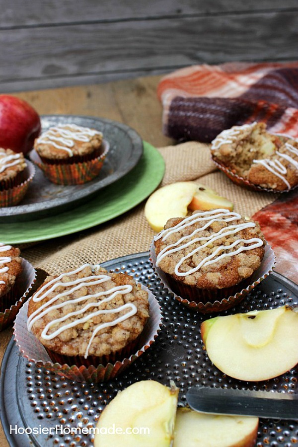 APPLE CRUMBLE CUPCAKES -- These Apple Pie Cupcakes aren't your ordinary cupcakes! The combination of chopped apples and applesauce makes these Apple Cupcakes moist and flavorful. The crumble topping adds a bit of crunch that pairs perfectly with the cinnamon and nutmeg in the cupcakes.