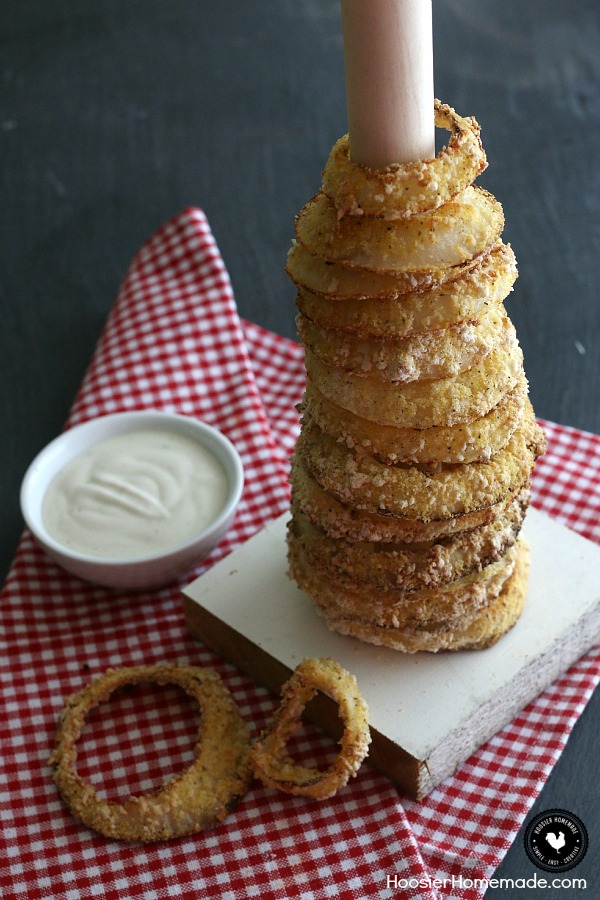 Oven Baked Onion Rings Recipe - No need to sacrifice the taste for a healthier version! These Onion Rings are easy to make and have less calories than fried! AND are Dairy Free! Whip up a batch for your next party, tailgating, game night and more!