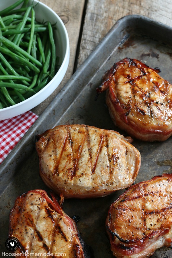 If you don't grill anything else this Summer, you MUST try these Barbecue Bacon Pork Chops! They are tender, juicy and full of flavor! Click on the Photo for the Pork Chop Recipe!