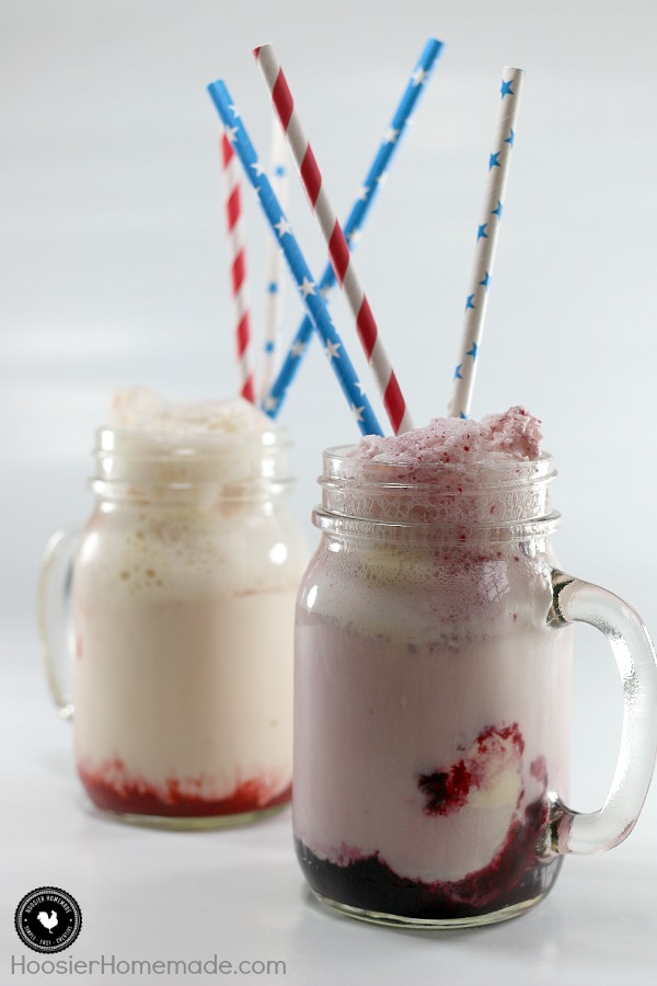 Berry Ice Cream Floats - skip the ice cream shop and make your own refreshing Ice Cream Floats at home! 2 ingredients is all you need for the strawberry or blackberry syrup, add Ice Cream and Seltzer and you have a delicious treat to enjoy! Be sure to save the recipe by pinning to your Recipe Board!