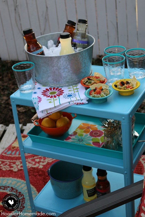 From rags to riches - this Beverage Cart Makeover is perfect for all your Outdoor Entertaining! With some sand paper, spray paint and a little elbow grease, this Bar Cart comes to life! Pin to your DIY Board!