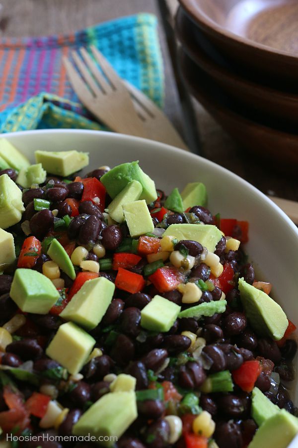 This Black Bean and Corn Salad couldn't be easier! With just a handful of ingredients, this delicious salad goes together in minutes! Perfect for parties, potlucks, tailgating, cookouts and more! Click on the Photo for Recipe!