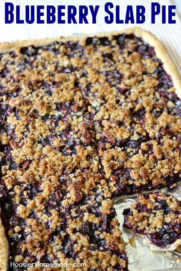 This flaky, single layer pie crust is filled with plump, juicy blueberries and topped with a crumb topping with pecans. Blueberry Slab Pie is perfect for your Summertime Parties, Father’s Day, Fourth of July or take along to a Potluck.