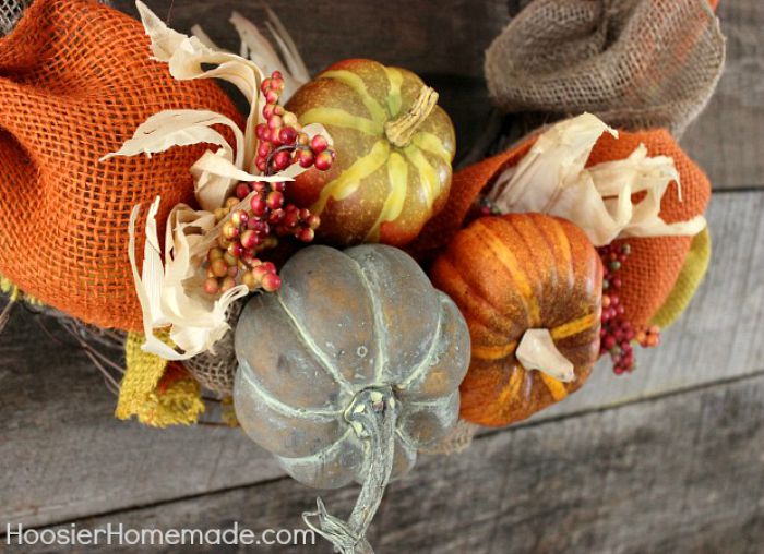 DIY FALL WREATH -- ThIS Fall Wreath takes minutes to make with just a few supplies! Brighten up your front door or inside your home with this easy to make wreath!