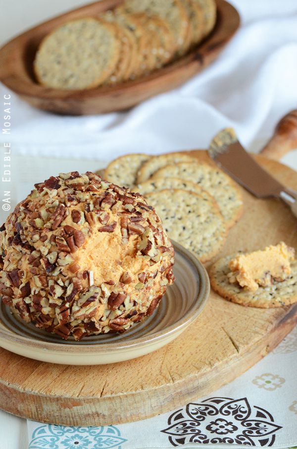 Perfect for the holidays - whip up this Cheddar Cheese Ball to take to parties, family dinners, office potlucks and more! Visit our 100 Days of Homemade Holiday Inspiration for more recipes, decorating ideas, crafts, homemade gift ideas and much more!