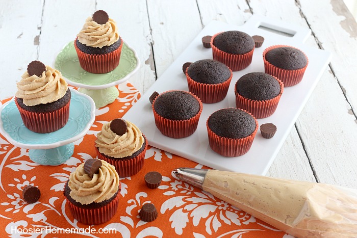 CHOCOLATE CUPCAKES WITH PEANUT BUTTER FROSTING -- This Homemade Chocolate Cupcakes Recipe will blow you away! The secret ingredient might just surprise you! These moist cupcakes are perfect for any occasion!