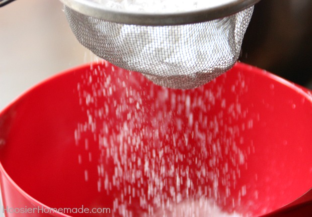 Sift the powdered sugar for frosting.