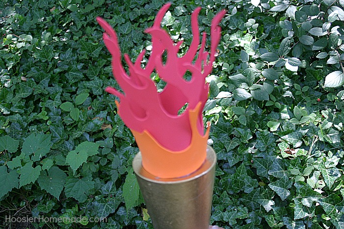 DIY OLYMPIC TORCH - Celebrate the Olympic Games with this fun Olympic Torch! The kids can help make it too! Use it for your Backyard Olympic Games! 