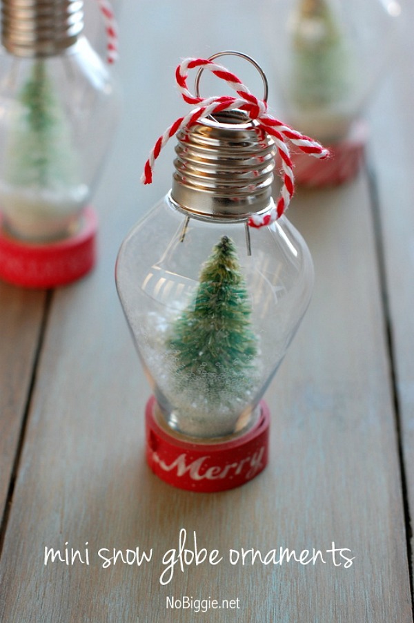 Make these adorable Mini Snow Globe Ornaments with simple supplies and little time! Visit our 100 Days of Homemade Holiday Inspiration for more recipes, decorating ideas, crafts, homemade gift ideas and much more!