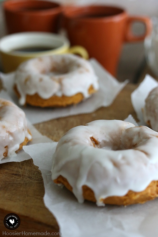With only 3 ingredients, you can have these delicious Homemade Pumpkin Doughnuts! Add a simple 2 ingredient glaze and they are out of this world! Grab a cup of coffee, because you are going to want a couple of these amazing Homemade Donuts! 