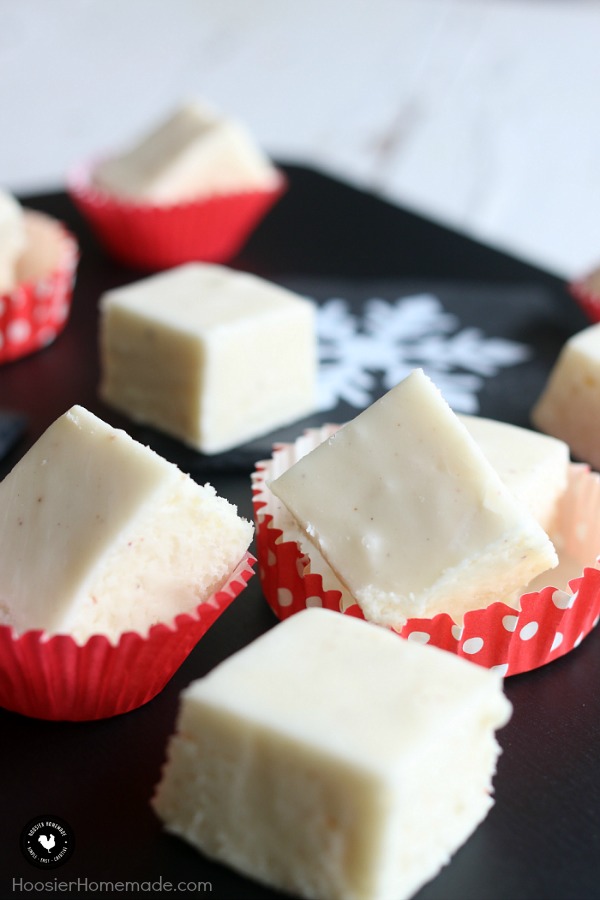 The perfect holiday treat to make and share as gifts - this Eggnog Fudge is EASY to make, goes together quickly. Whip up a batch to share with friends, teachers, neighbors, co-workers and more! Visit our 100 Days of Homemade Holiday Inspiration for more recipes, decorating ideas, crafts, homemade gift ideas and much more!