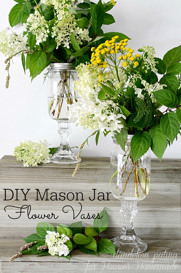 Gorgeous right? These farmhouse style flower arrangements were created along with the DIY mason jar vases to infuse your home with farmhouse style. Project created by Dandelion Patina for Hoosier Homemade. #masonjars #farmhousestyle