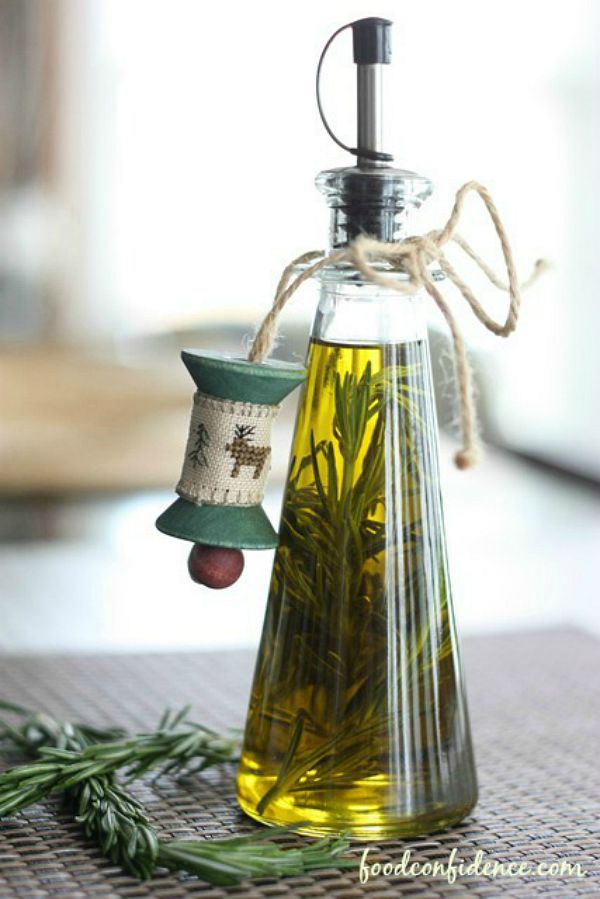 Rosemary infused Olive Oil makes a great food gift for the holidays! It's easy and tastes great! Visit our 100 Days of Homemade Holiday Inspiration for more recipes, decorating ideas, crafts, homemade gift ideas and much more!