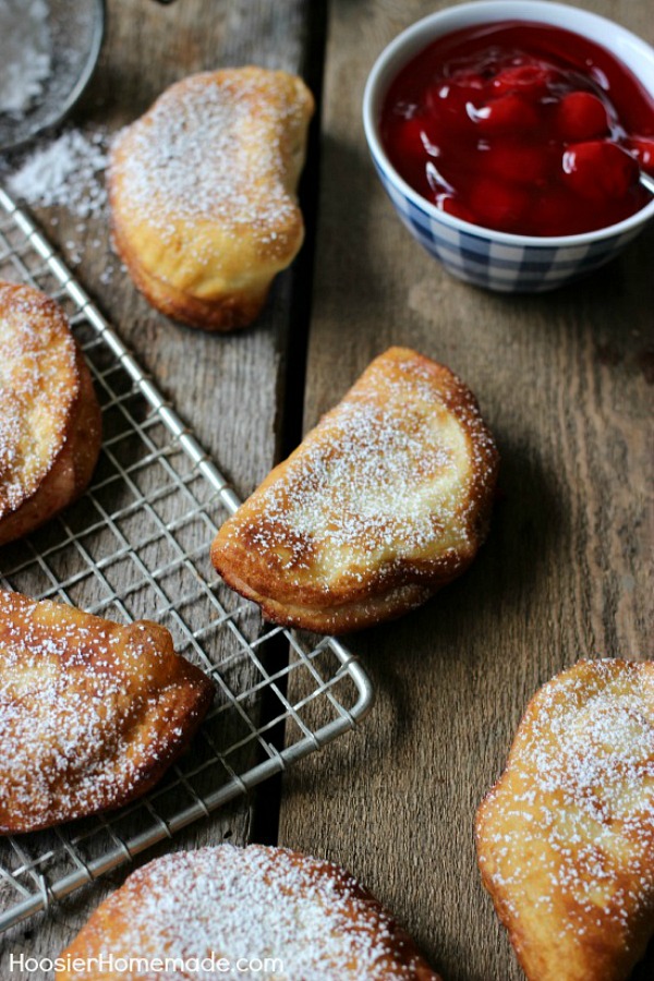 Only 2 ingredients is all you need for these Easy Fried Pies (plus a little flour for rolling and oil to cook them in). Perfect for a super quick dessert! Be sure to save by pinning to your Recipe Board!