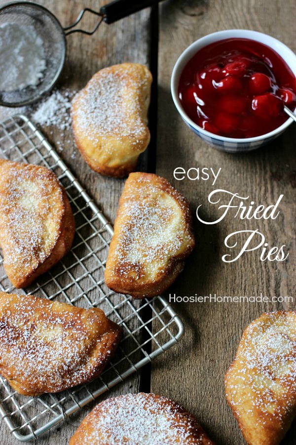 Only 2 ingredients is all you need for these Easy Fried Pies (plus a little flour for rolling and oil to cook them in). Perfect for a super quick dessert! Be sure to save by pinning to your Recipe Board!