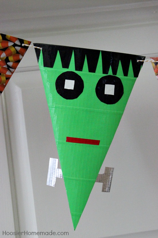 Simple Halloween Craft | Banner made with craft paper and Duck Tape | Instructions on HoosierHomemade.com