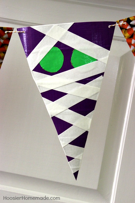 Simple Halloween Craft | Banner made with craft paper and Duck Tape | Instructions on HoosierHomemade.com