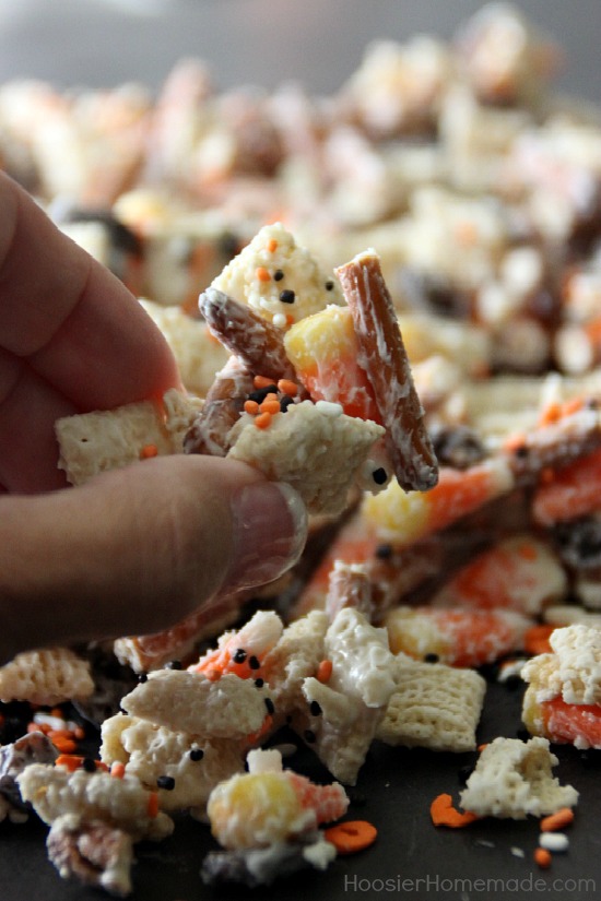 Whip up this fun Halloween Treat in about 15 minutes! Kids and adults will love this Candy Corn Party Mix! Pin it to your Halloween Board! 