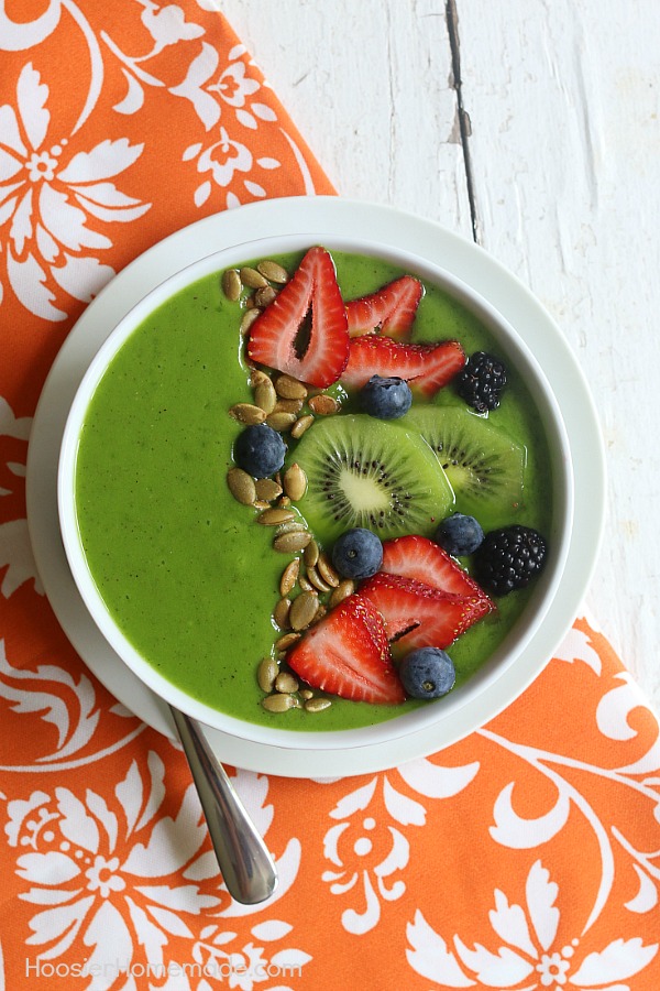 Packed full of flavor and goodness, this Tropical Smoothie Bowl will start your morning off right! Whip up the smoothie in seconds and then add delicious ingredients to the top for a one of a kind breakfast! 