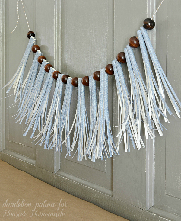 paper straw tassel garland in denim by dandelion patina