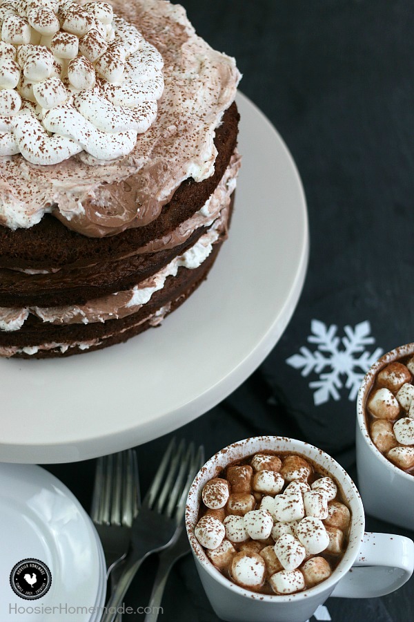 This showstopping Hot Chocolate Cake has layers of moist chocolate cake, pudding, whipped topping, marshmallows and yes, it has hot chocolate too. With these simple ingredients, you are on your way to this spectacular Holiday Cake that everyone will LOVE!