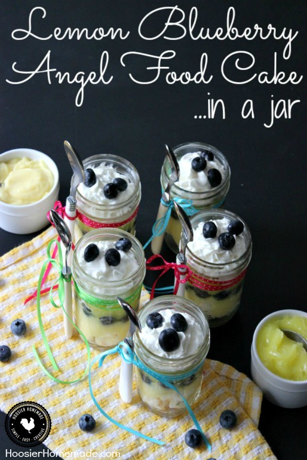 Layers of Angel Food Cake, Lemon Pie Filling, Pudding, Blueberries and topped with Whip Cream - this Lemon Blueberry Angel Food Cake in a Jar makes the perfect Spring Dessert Recipe! Pin to your Recipe Board!