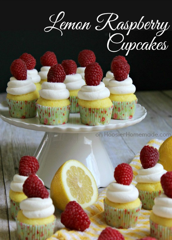 Lemon Cupcakes filled with Red Raspberry Spreadable Fruit! They are baked in mini cupcake liners, making them a sweet little bite, perfect for after dinner! Pin to your Cupcake Board! 