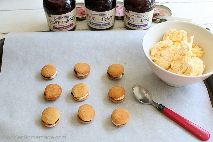 MINI ICE CREAM SANDWICHES -- These bite-size ice cream sandwiches can be put together in minutes! Kids of ALL ages will love them! Dip in chocolate coating, add sprinkles or leave plain! 