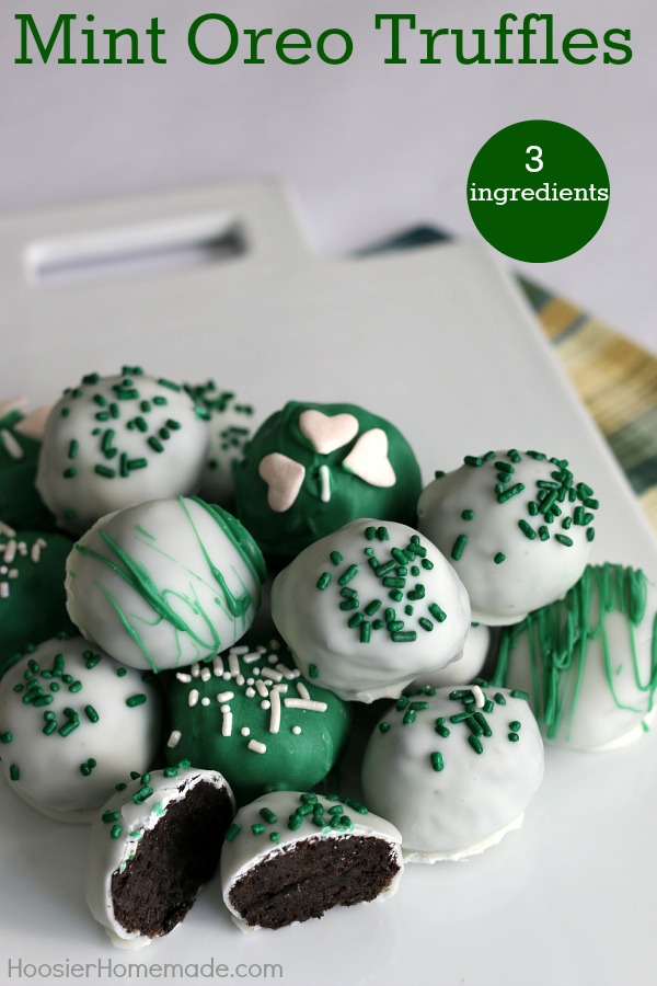 Mint Oreo Truffles - ONLY 3 ingredients is all you need for these delicious St. Patrick's Day treats! The kids will have a blast crushing the Oreos, and helping form the balls. Dip in chocolate coating, add sprinkles and you have a fun treat! Pin to your Recipe Board!