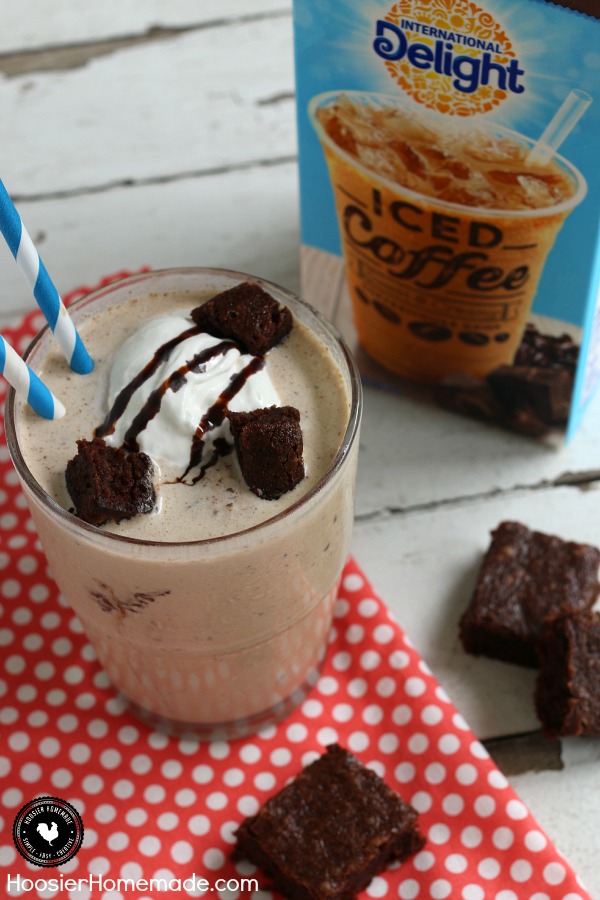 Mocha Brownie Shake - luscious, refreshing shake made with Mocha Iced Coffee, Ice Cream and Brownies - YUM! Top with a dollop of whipped topping, drizzle of chocolate syrup and a few brownie chunks and you have a delicious treat to enjoy at home! Be sure to save the recipe by pinning to your Recipe Board!