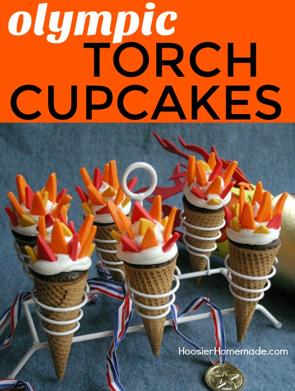 OLYMPIC TORCH CUPCAKES -- Celebrate the Olympics will these fun to make Torch Cupcakes! The flames are made with Candy Clay, it's like fondant, but taste a LOT better!