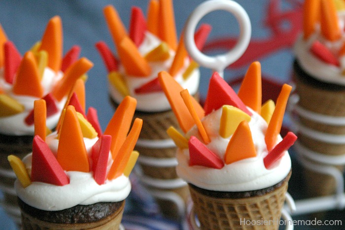 OLYMPIC TORCH CUPCAKES -- Celebrate the Olympics will these fun to make Torch Cupcakes! The flames are made with Candy Clay, it's like fondant, but taste a LOT better! 