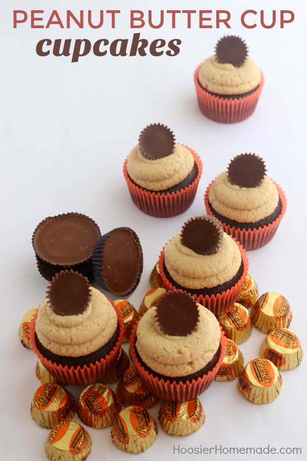 PEANUT BUTTER CUP CUPCAKES -- These Chocolate Cupcakes start with a moist, delicious recipe that includes peanut butter cups in the cupcakes, and topped with a creamy Peanut Butter Frosting! And of course, another Peanut Butter Cup on top!