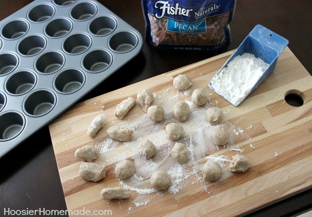 Roll the crust into equal size balls for the Pumpkin Pecan Pie Bites