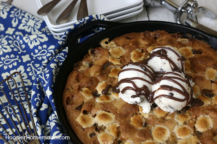 SKILLET COOKIE -- Warm right from the oven with a big scoop of Ice Cream! YUM! This Skillet Cookie Recipe is filled with Chocolate Chunks and Marshmallows! 