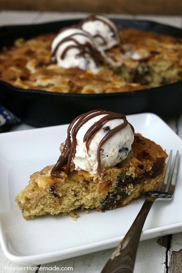 SKILLET COOKIE -- Warm right from the oven with a big scoop of Ice Cream! YUM! This Skillet Cookie Recipe is filled with Chocolate Chunks and Marshmallows! 