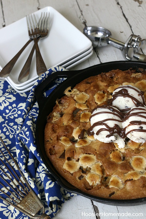 SKILLET COOKIE -- Warm right from the oven with a big scoop of Ice Cream! YUM! This Skillet Cookie Recipe is filled with Chocolate Chunks and Marshmallows! 