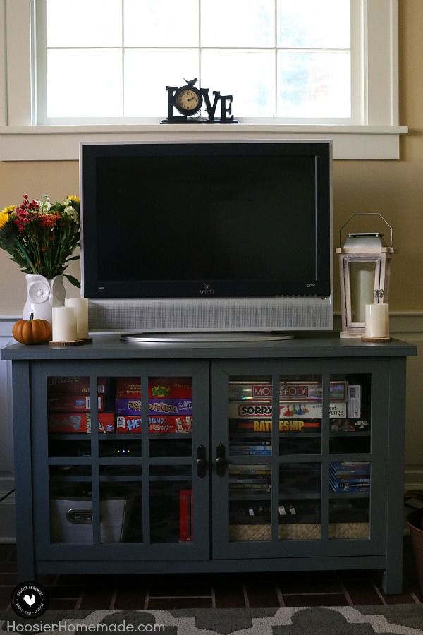 Creating a comfortable home that is organized yet stylish looking doesn't need to cost a lot of money. This Stylish Family Room Storage and TV Stand is perfect! The gray-blue color goes great with any decor. 
