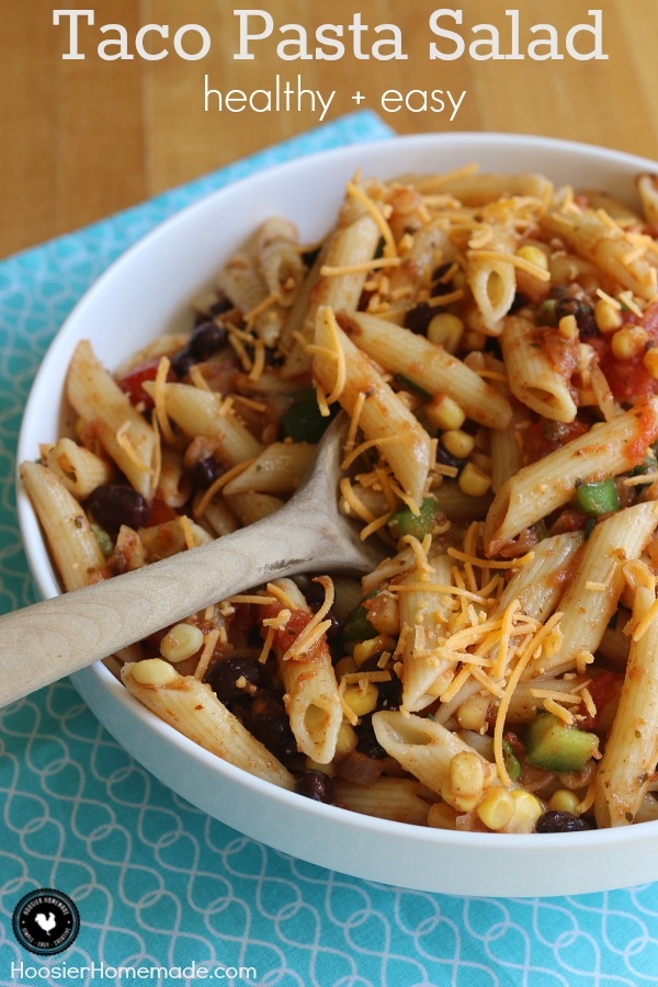 A simple Pasta Salad Recipe filled with your favorite Taco flavors! And bonus - it's healthy too! This Taco Pasta Salad is perfect for potlucks, picnics or for a side dish on Taco Night! Pin to your Recipe Board!