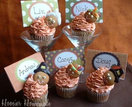 I think the place cards in the cupcakes not only welcomes your guests