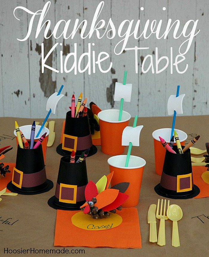 Create this fun space for the kids to enjoy their Thanksgiving Dinner! With just a few simple supplies, the kids will LOVE helping you make this Thanksgiving Kiddie Table complete with a Pilgrim Hat Crayon Holder, Mayflower Drinking Straws and Turkey Place Holders! 