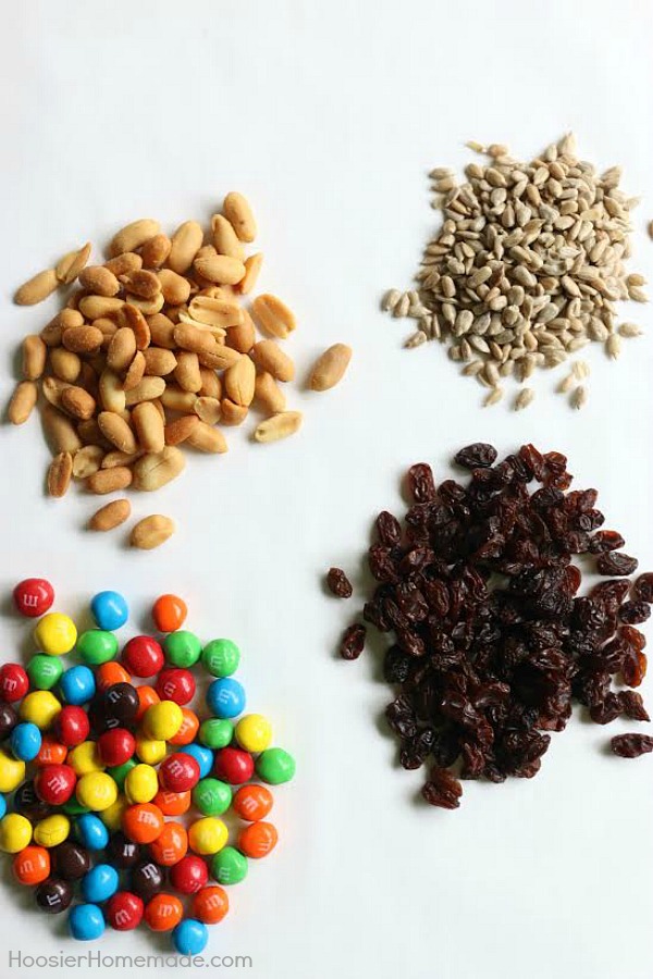 No need to buy those expensive snack mixes! This Recipe for Trail Mix is SUPER easy with only 4 ingredients! Whip up a batch in under 5 minutes and have snacks for after-school, traveling, games, movies and more! 