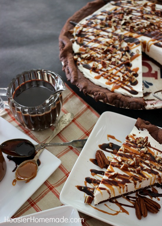 Turtle Pie : Chocolate Cake Mix Pie Crust filled with No Bake Cream Cheese filling, and topped with caramel, hot fudge and pecans! Recipe on HoosierHomemade.com