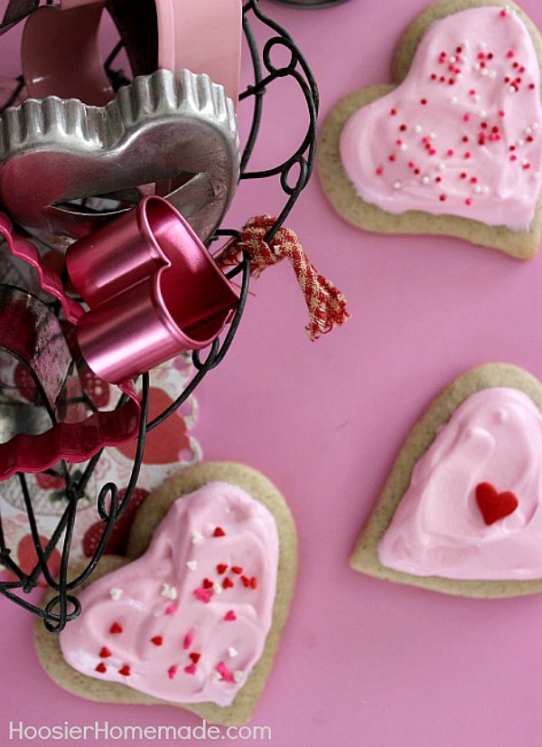 Whip up a batch of these Valentine Sugar Cookies! Once you try this Sugar Cookie Recipe, you will NEVER use another one! It's soft, full of flavor and delicious! 