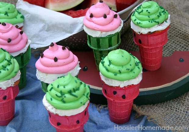 Watermelon Cupcake Cones | Watermelon flavored Cupcakes baked right in the Ice Cream Cones, makes a fun treat for Summer time! Recipe on HoosierHomemade.com